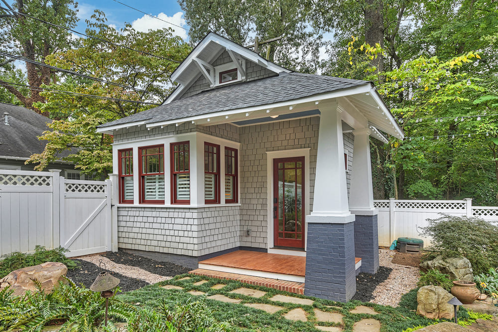 Custom home addition exterior gray guest suite with stone walkway by hopedale in charlotte